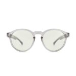 ANTEOJO DE SOL VULK VXC GRAY BLUE BLOCK FRENTE. ARMAZON G-FLEX. PATILLAS DE ACETATO CON BISAGRAS CON SISTEMA FLEX. ARMAZON COLOR GRIS TRANSLUCIDO Y PATILLAS COLOR NEGRO. LENTE COLOR VERDE CLARO FOTOCROMÁTICAS A GRIS